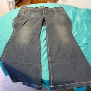 TORRID Feel The Fit Bombshell Flare Jeans